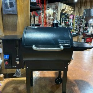 pellet grill smoking brisket in backyard BBQ